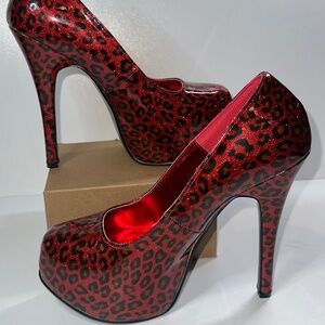 Like new Bordello red cheetah print platform
